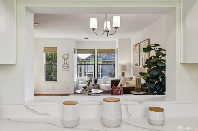 interior space featuring an inviting chandelier