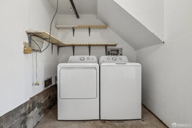 laundry room with washing machine and dryer