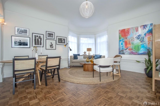 interior space featuring dark parquet floors