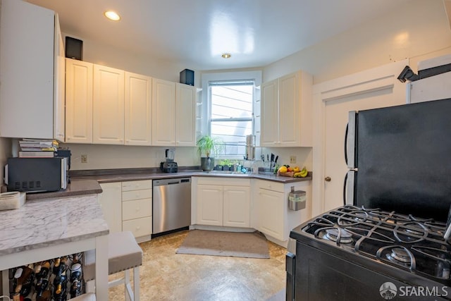 1380 Washington St, San Francisco, CA 94109 - kitchen featuring black appliances, white cabinetry, and recessed lighting