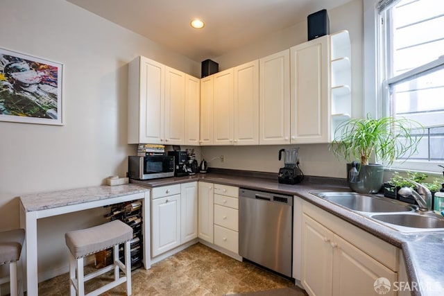 1380 Washington St, San Francisco, CA 94109 - kitchen with stainless steel appliances, a sink, recessed lighting, and white cabinetry
