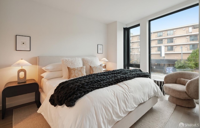 bedroom featuring wood-type flooring