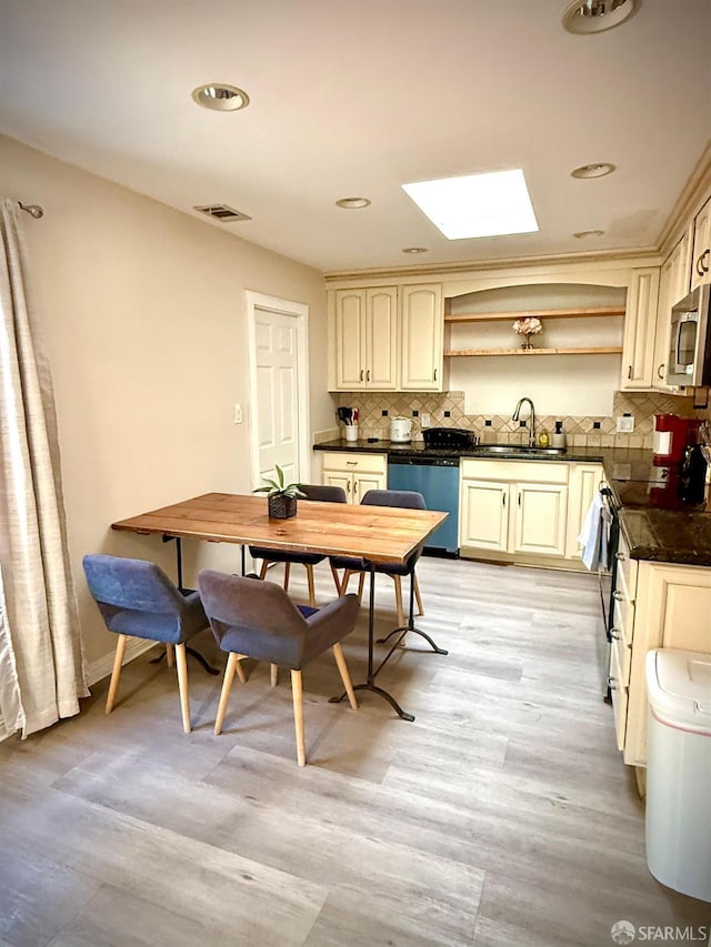 38002 Stenhammer Dr, Fremont, CA 94536 - kitchen with stainless steel appliances, dark countertops, open shelves, tasteful backsplash, and a sink