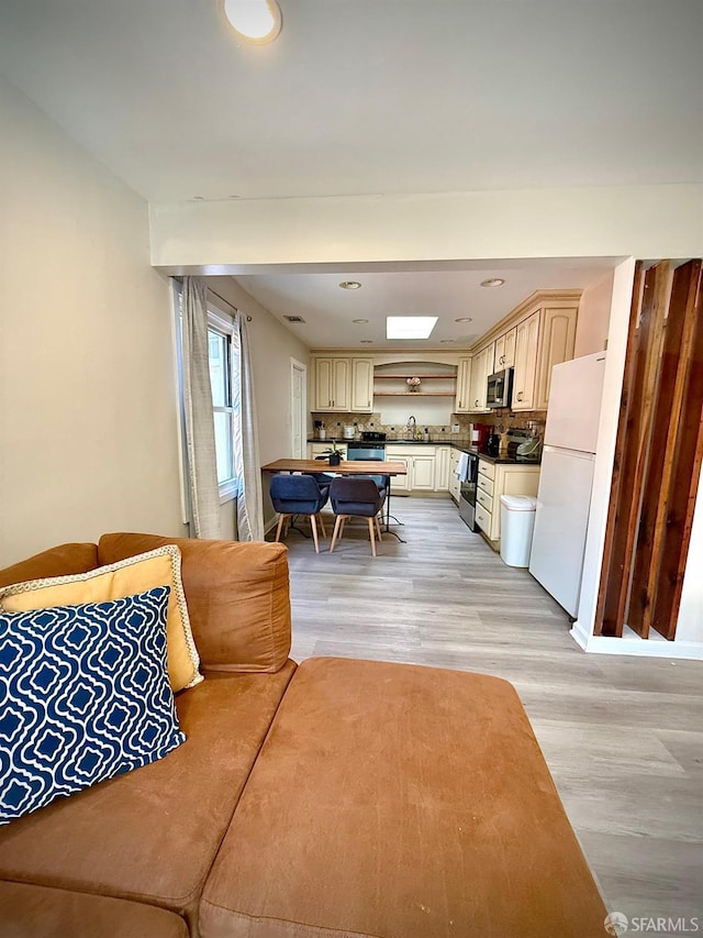 38002 Stenhammer Dr, Fremont, CA 94536 - dining space featuring light wood-style floors and recessed lighting