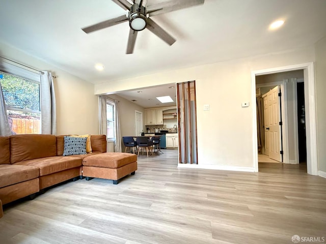 38002 Stenhammer Dr, Fremont, CA 94536 - living room featuring light wood-type flooring, a ceiling fan, baseboards, and recessed lighting