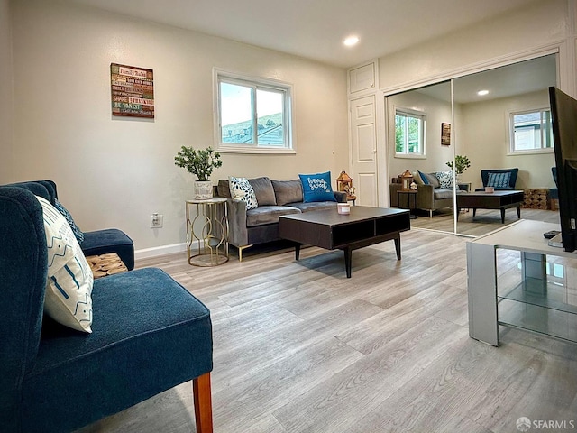 38002 Stenhammer Dr, Fremont, CA 94536 - living area featuring light wood-style flooring, recessed lighting, and baseboards