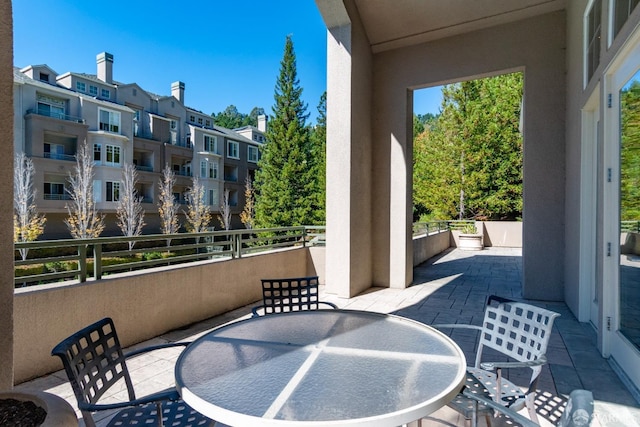 view of patio / terrace with a balcony