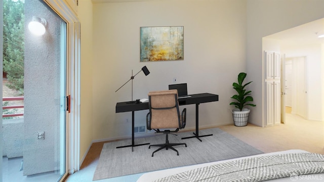 view of carpeted home office