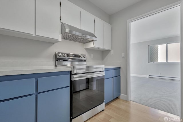 kitchen with light wood-type flooring, baseboard heating, stainless steel electric stove, wall chimney exhaust hood, and white cabinets