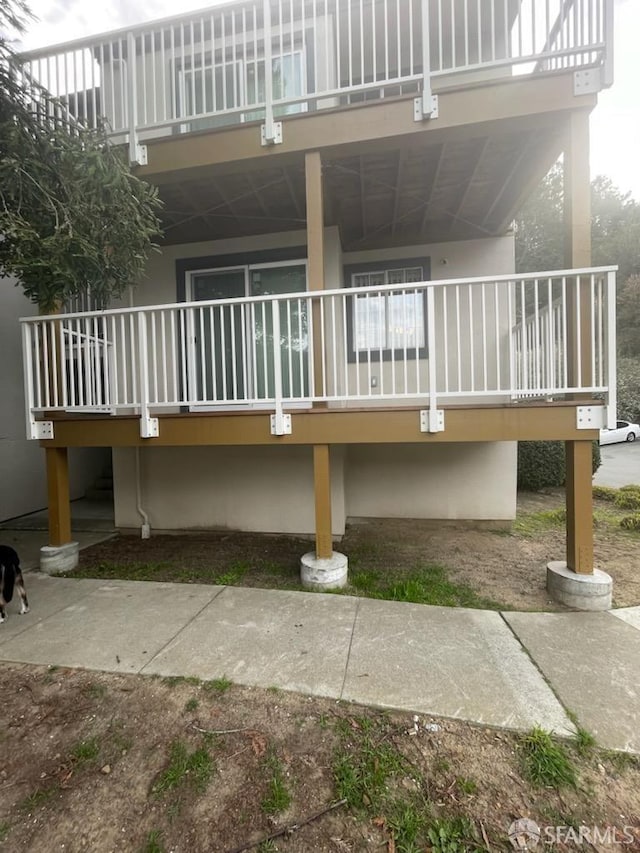 back of property with stucco siding