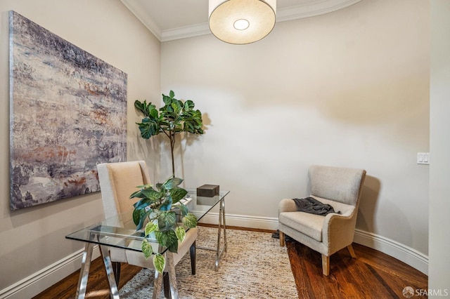 home office with ornamental molding and dark hardwood / wood-style flooring