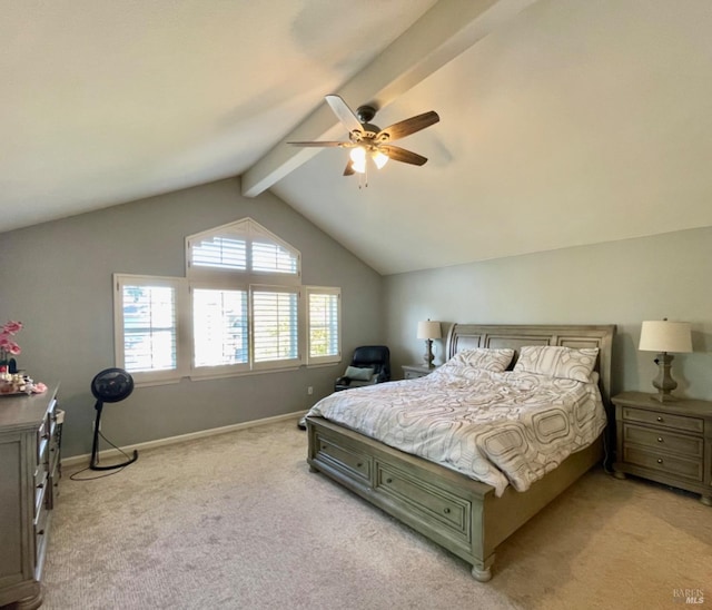 carpeted bedroom featuring lofted ceiling with beams and ceiling fan