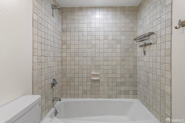 875 La Playa St Unit 373, San Francisco, CA 94121 - bathroom featuring tub / shower combination, toilet, and a textured wall