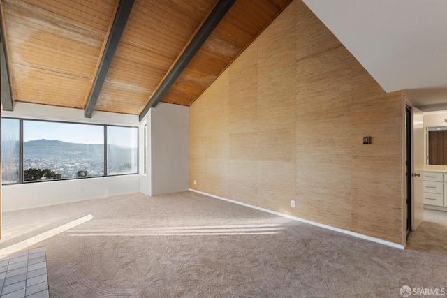 unfurnished room featuring high vaulted ceiling, beam ceiling, carpet flooring, and wood ceiling