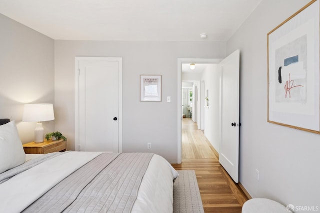 600 Ellsworth St, San Francisco, CA 94110 - bedroom featuring light wood-style floors
