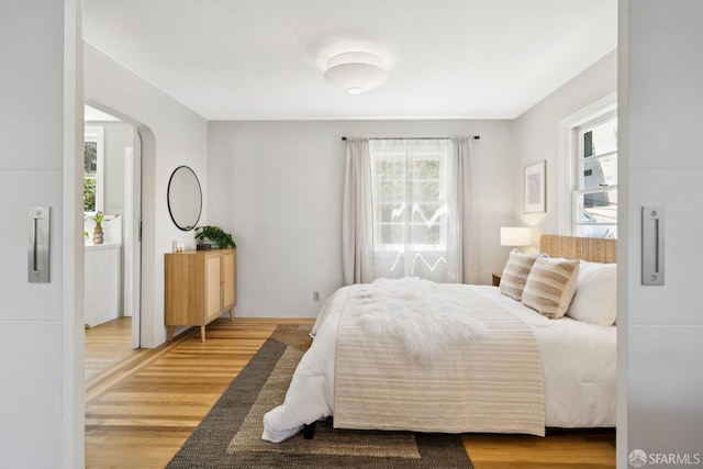 600 Ellsworth St, San Francisco, CA 94110 - bedroom with multiple windows and light wood finished floors