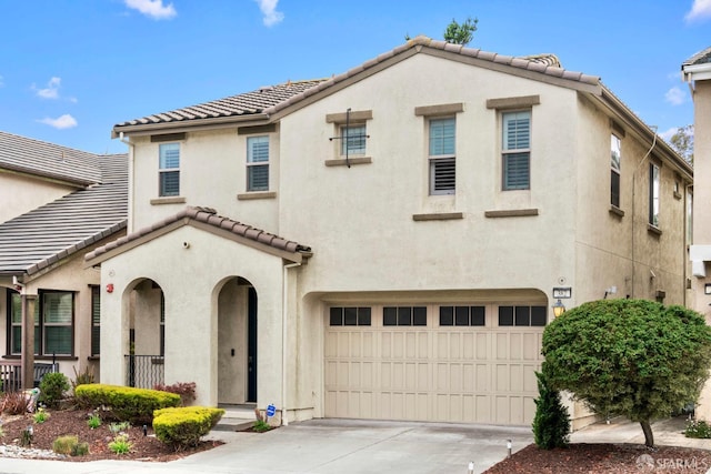 382 Crestview Cir, Daly City, CA 94015 - view of front facade with a tiled roof, an attached garage, stucco siding, and driveway