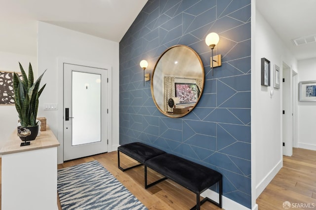 2031 Buena Vista Dr, Pinole, CA 94564 - entryway with light wood-style floors and tile walls