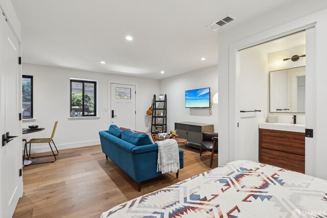 2031 Buena Vista Dr, Pinole, CA 94564 - bedroom with light wood-type flooring, recessed lighting, and baseboards