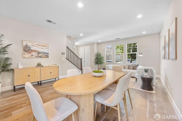 192 Montevina Way, Hayward, CA 94545 - dining room with light wood-type flooring, stairway, baseboards, and recessed lighting