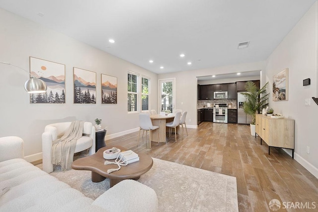 192 Montevina Way, Hayward, CA 94545 - living area with light wood-type flooring, baseboards, and recessed lighting