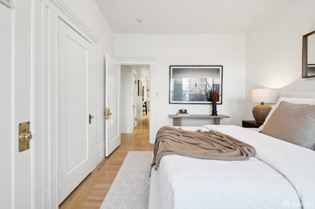 bedroom with light hardwood / wood-style flooring