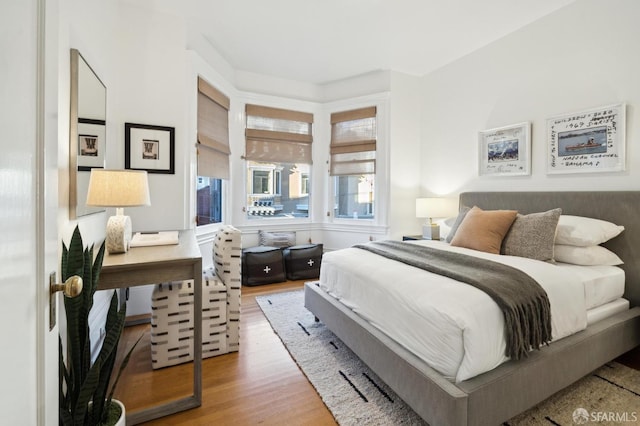 bedroom featuring hardwood / wood-style flooring