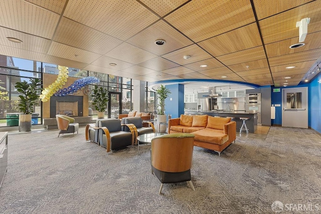 building lobby featuring a wall of windows and recessed lighting