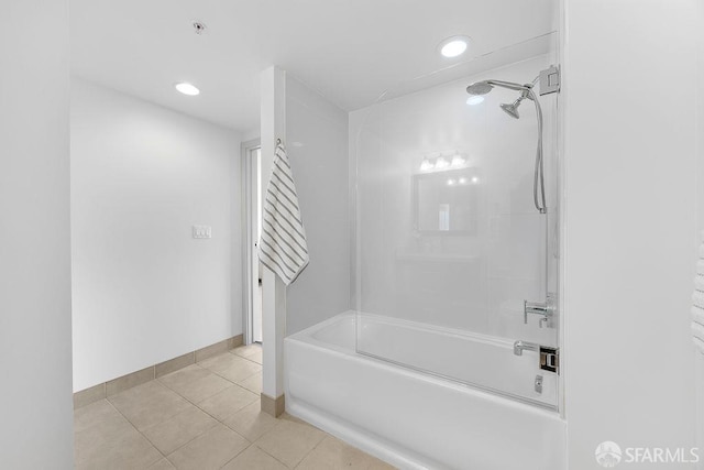 full bath with tile patterned floors, recessed lighting, baseboards, and washtub / shower combination
