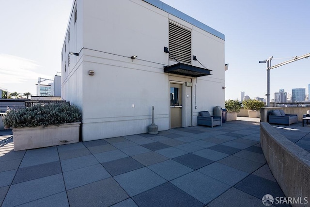 back of house featuring a patio area
