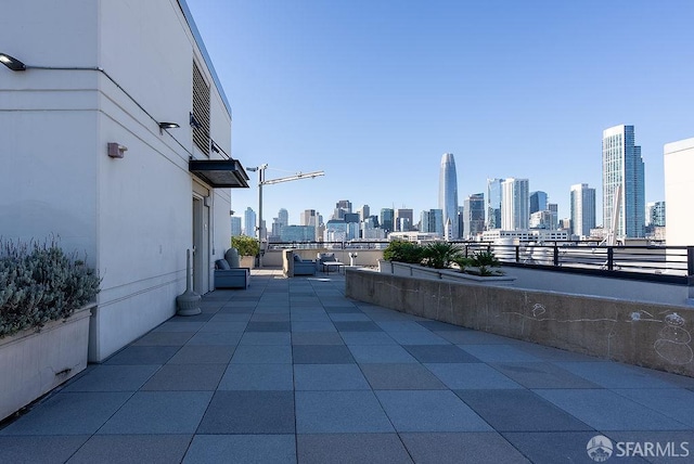 view of patio featuring a skyline view