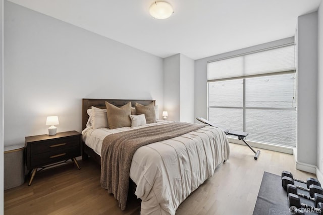 723 Taylor St Unit 402, San Francisco, CA 94109 - bedroom featuring multiple windows and light wood-type flooring