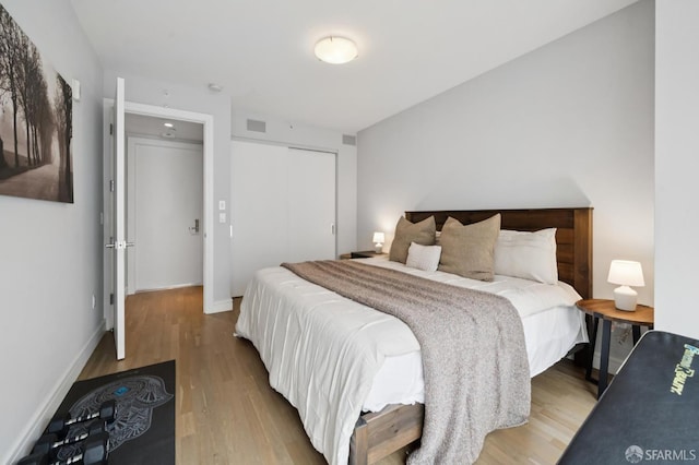 723 Taylor St Unit 402, San Francisco, CA 94109 - bedroom featuring wood finished floors and a closet