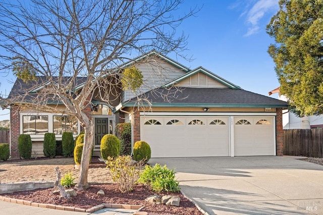 view of front of home with a garage