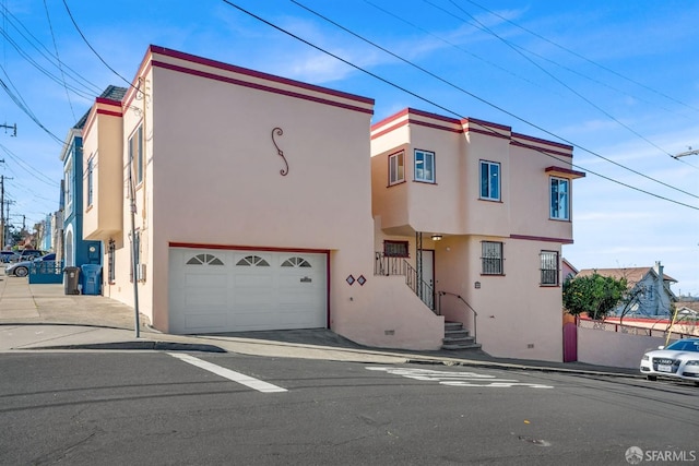 view of front of property featuring a garage