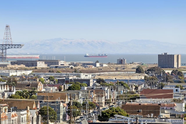 view of city featuring a water and mountain view