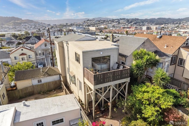 birds eye view of property featuring a mountain view