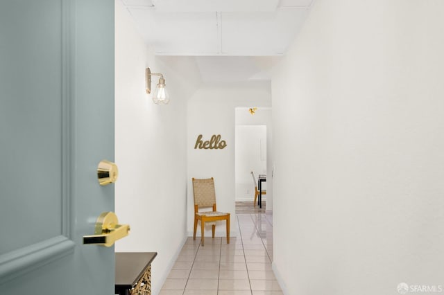 hallway featuring light tile patterned floors