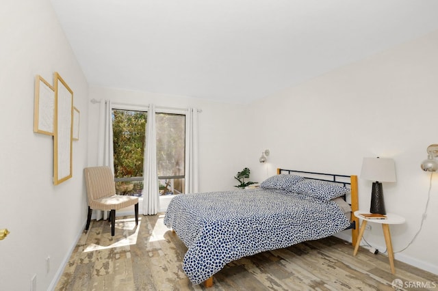 bedroom with light wood-type flooring