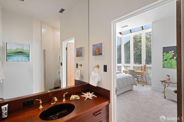 full bath featuring vanity, visible vents, a shower, and ensuite bathroom