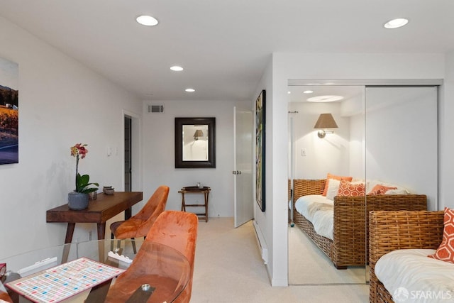 interior space with recessed lighting, visible vents, and light colored carpet