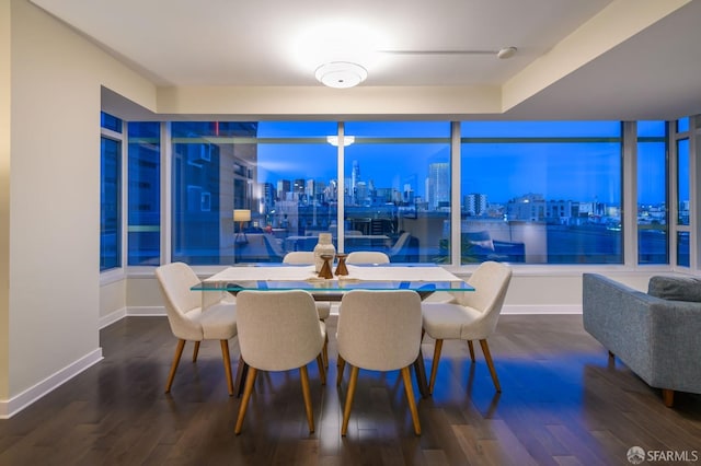 dining room with hardwood / wood-style floors