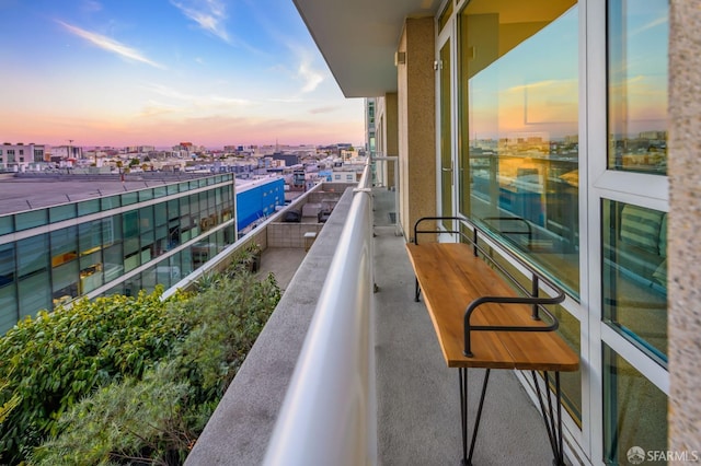 view of balcony at dusk