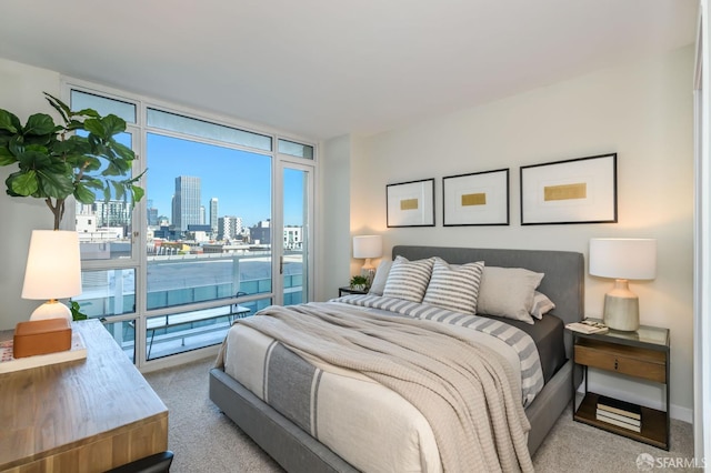 bedroom featuring light carpet