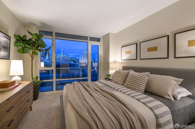 bedroom featuring light carpet