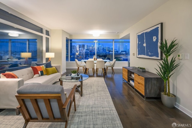 living room with dark hardwood / wood-style flooring