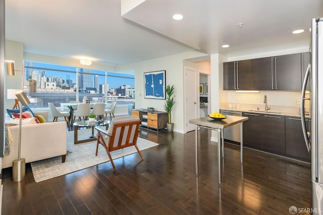 living room with sink and dark hardwood / wood-style flooring