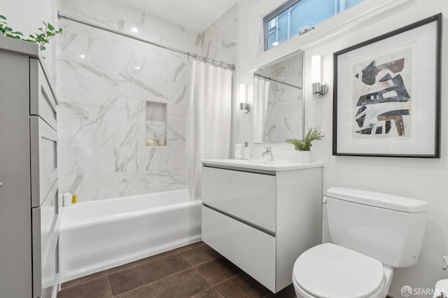 full bathroom featuring toilet, tile patterned floors, shower / bathtub combination with curtain, and vanity