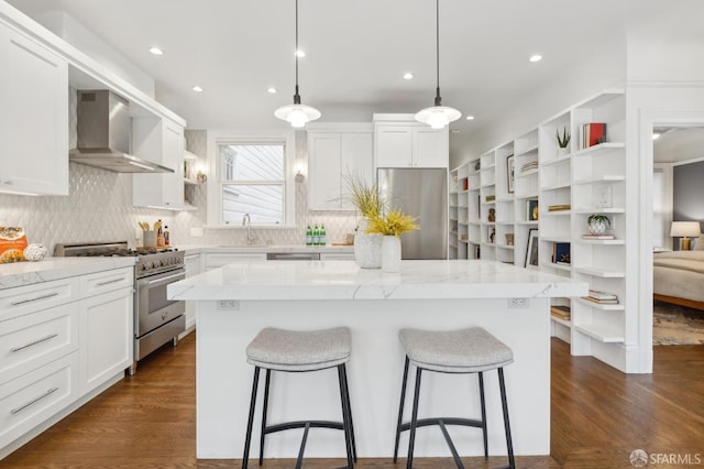 kitchen with white cabinets, wall chimney exhaust hood, stainless steel appliances, open shelves, and a sink