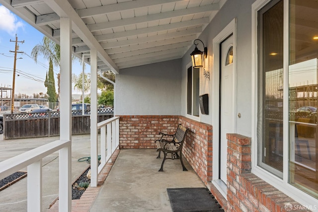 balcony featuring a porch